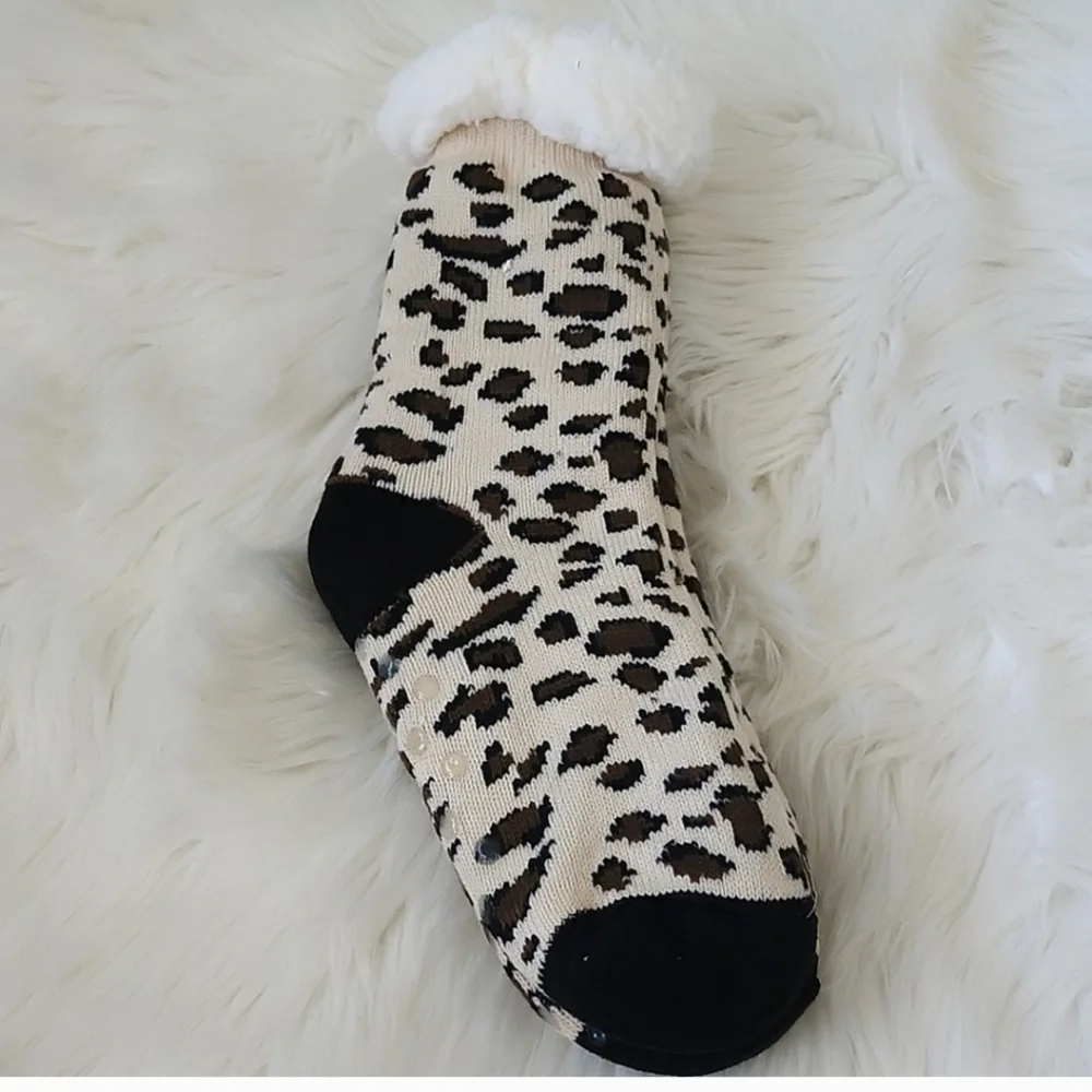 Set of Muk Luk socks, Maurices slippers/socks, and Rooted Soul socks NEW